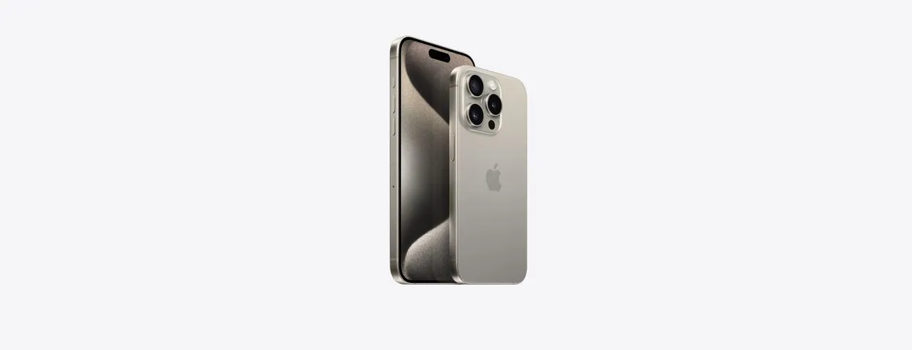 iPhone 15 Pro in titanium finish showing Action Button