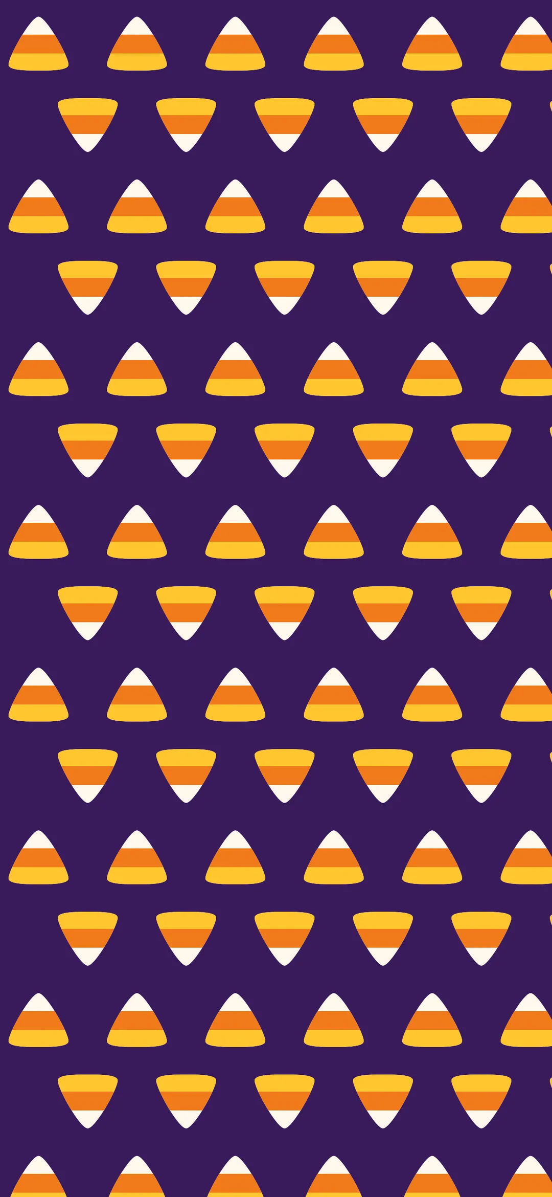 Candy corn pattern on purple Halloween wallpaper