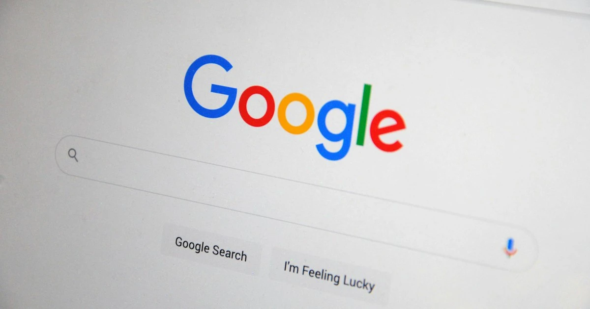 Close-up of the Google search home page on a laptop screen