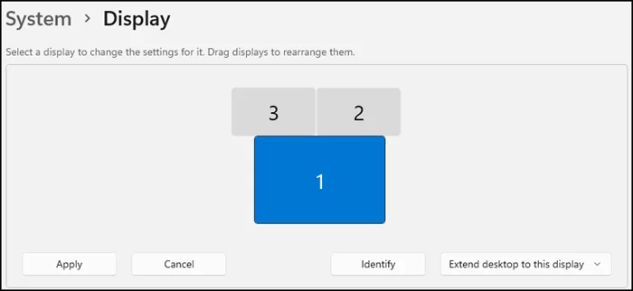 Windows 11 Settings > System > Display page showing three monitors in the arrangement diagram with Identify and Apply buttons