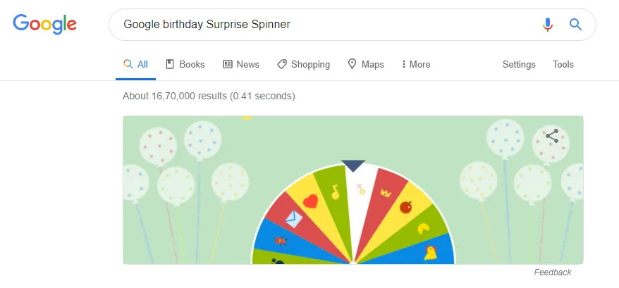 Birthday surprise spinner linking to random Google doodle games